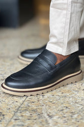 Loafer Tratorado em Couro Preto